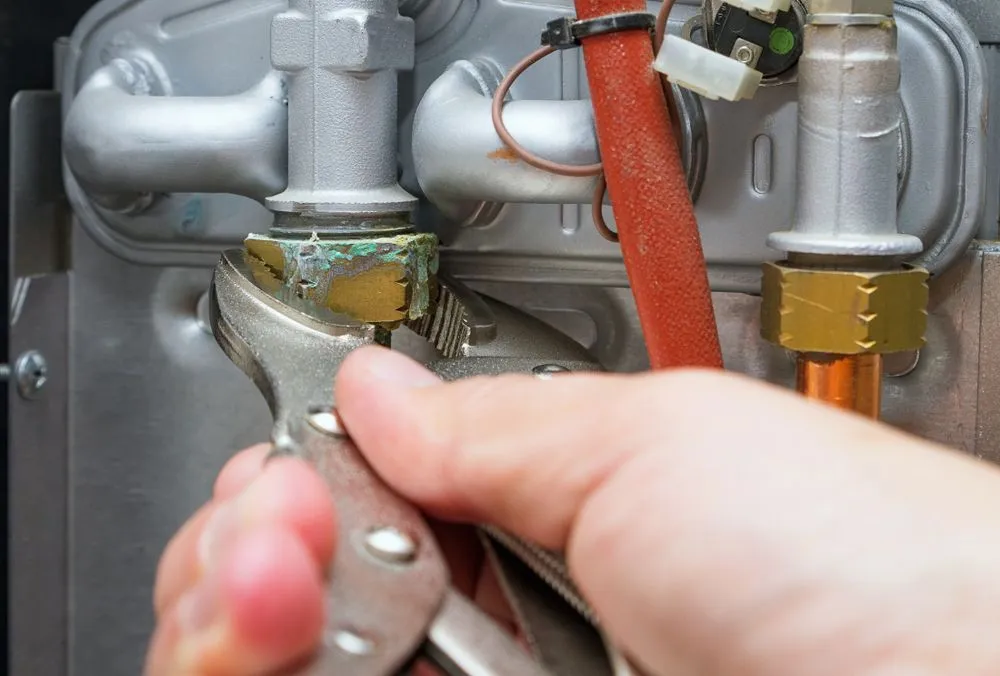 gas fitter checking gas heating system 1920w